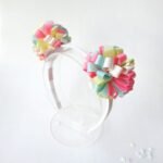 Tiara de pompons colorida