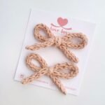 Par de laços tricotin