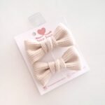 Par de laços tricot