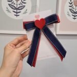 Laço escolar com pontas