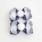 Par de laços pelúcia