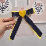 Laço escolar com pontas