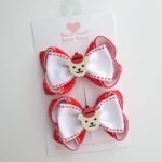 Par de laços Maple Bear